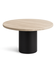 Hero image showing Catalina Dining Table with matte travertine round top and black steel cylindrical base