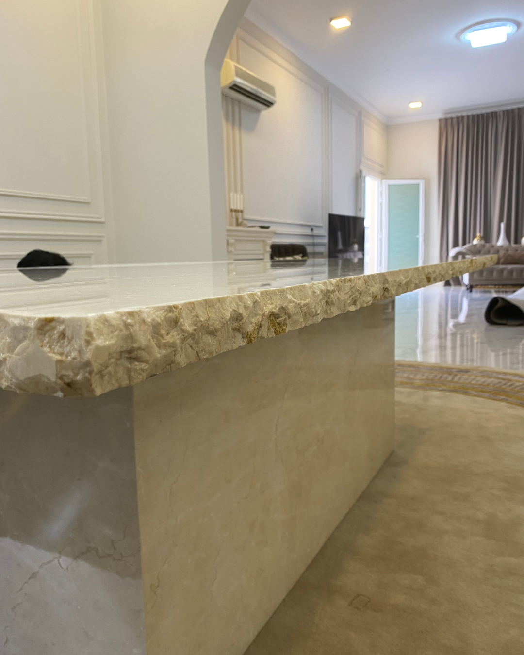 Close-up of natural chipped edge detail in marble