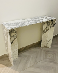Frontal angled view of Avara Console Table with Arabescato marble and T-shaped leg