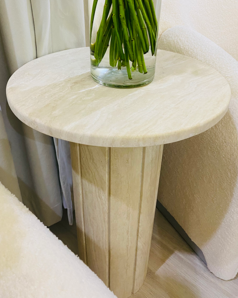 Rounded-edge travertine top detail