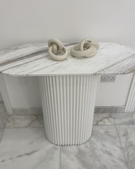 Styled in a neutral-toned entryway with minimalist decor