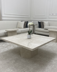 Front view showcasing the square marble top and hexagonal base