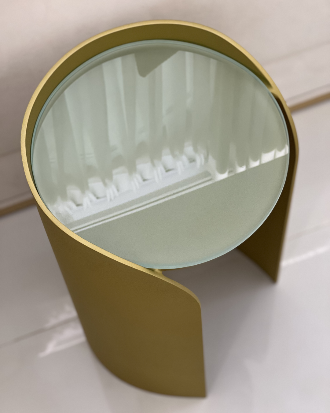 Top view of Lucente serving table highlighting smooth frosted glass surface