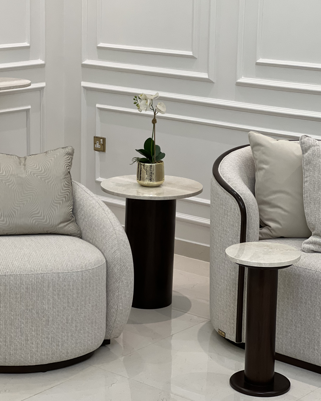 Side Table next to armchair in living space