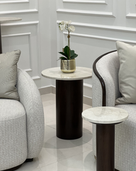 Luna Side Table styled beside sofa with small plant