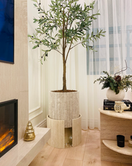 Luxuria Planter styled next to sofa and fireplace