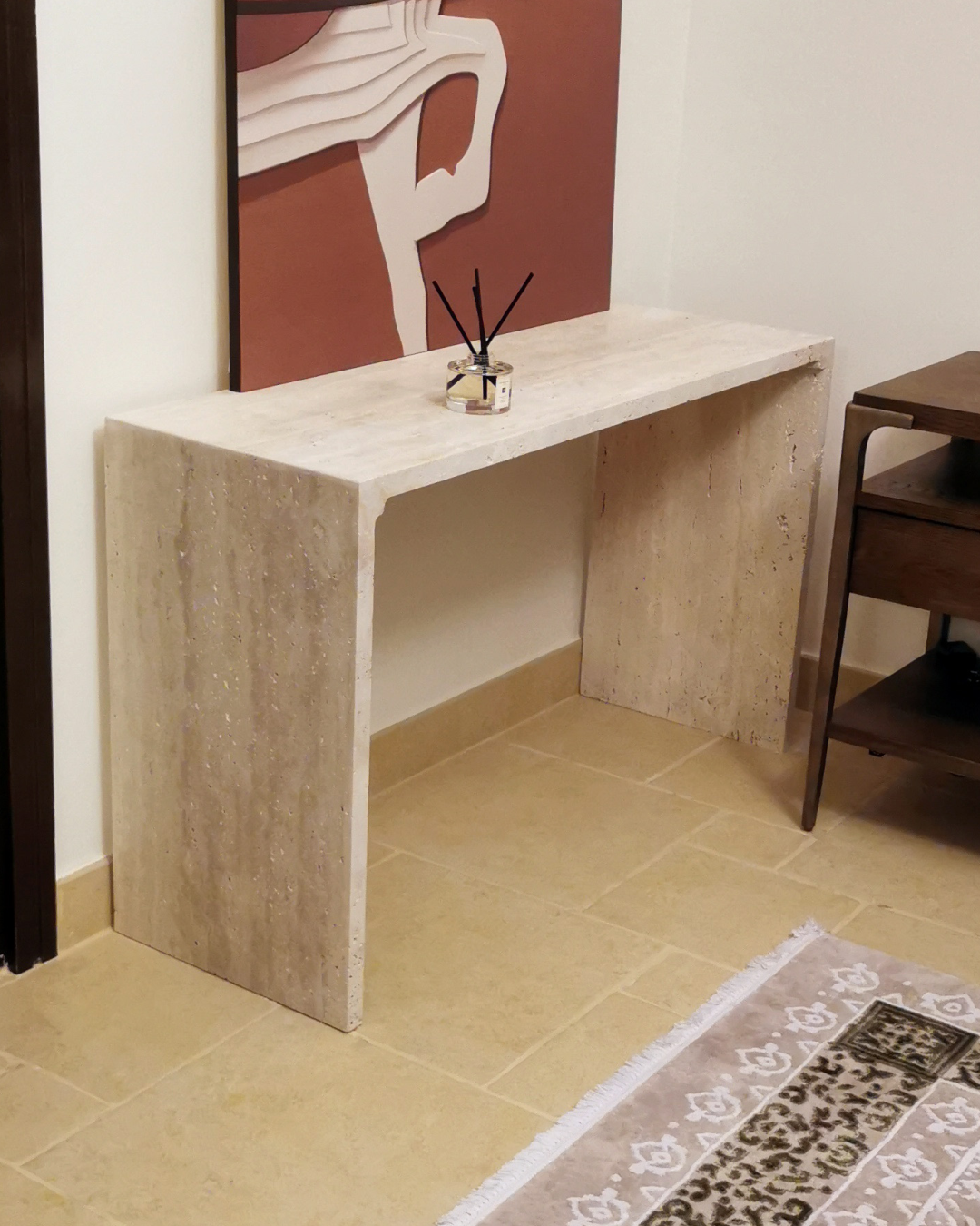 Mira Console Table styled against neutral wall and art backdrop