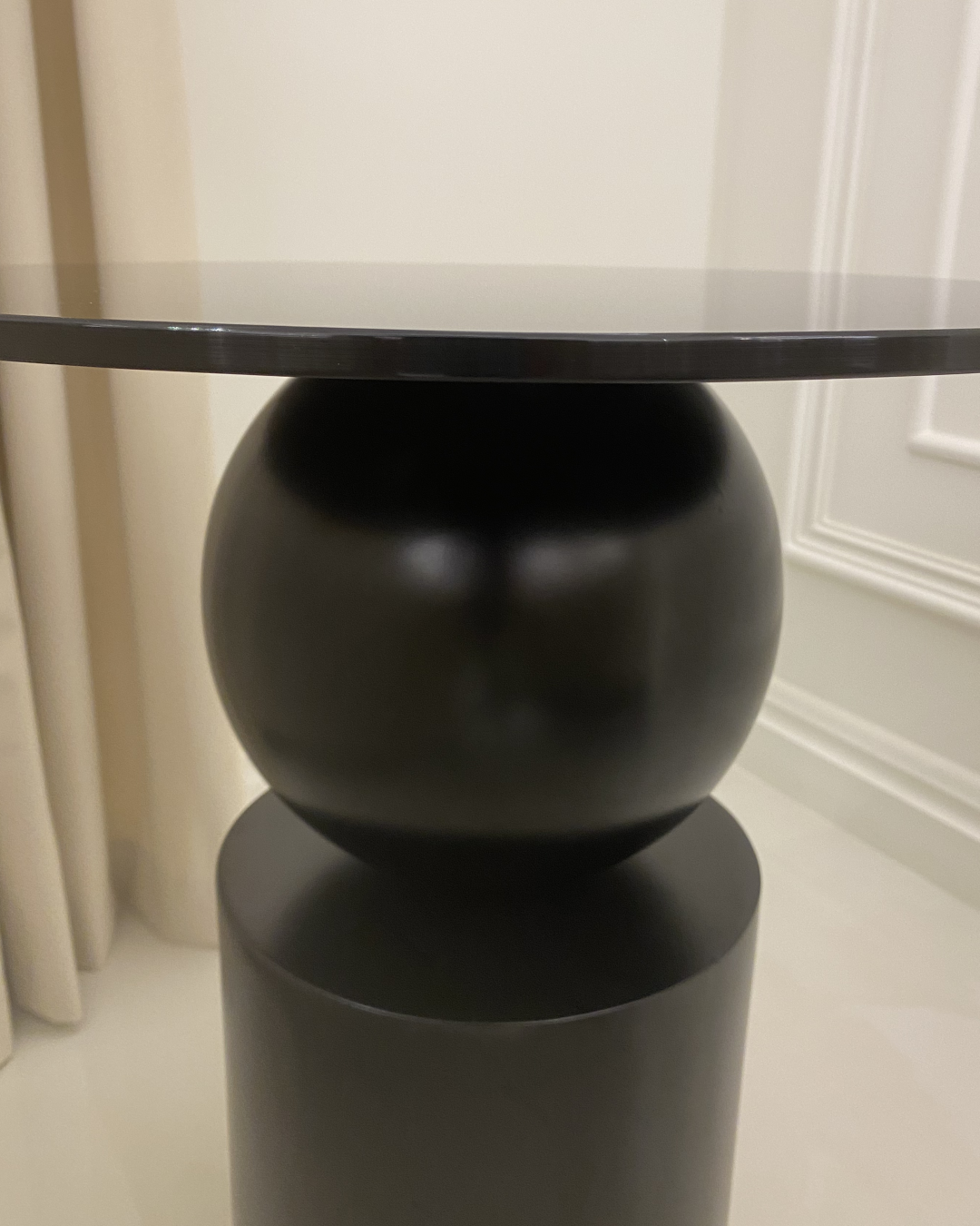 Close-up of base paint and glass edge reflection