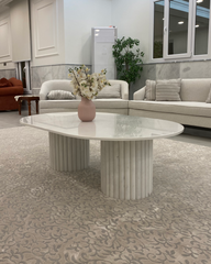 Full view of Nova Coffee Table with capsule marble top and fluted bases