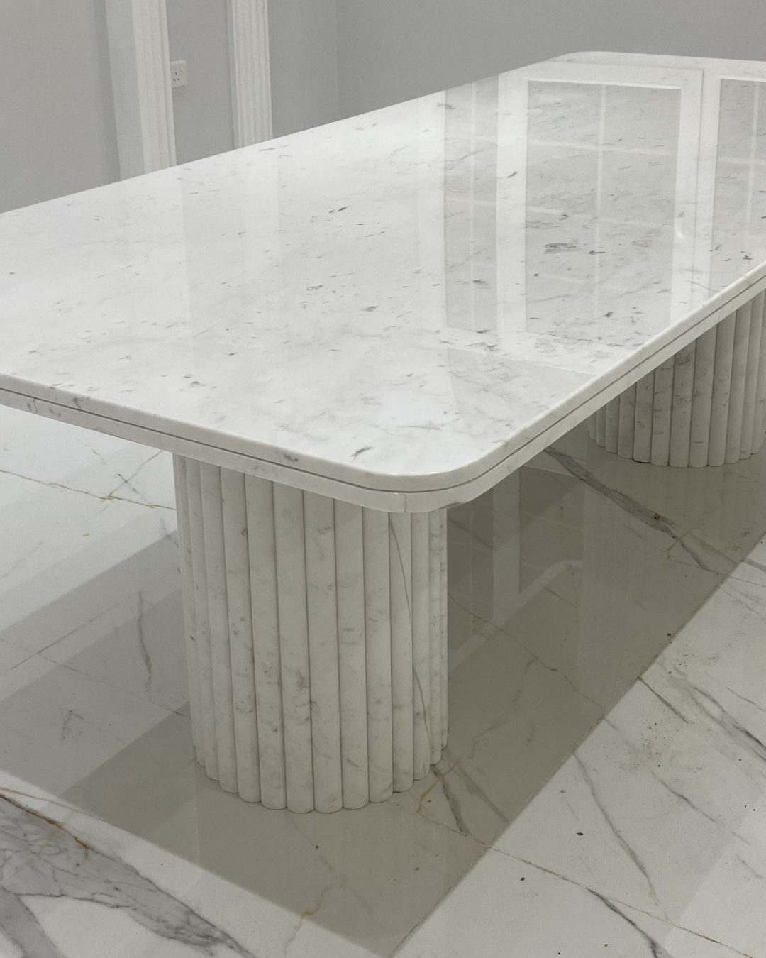 Top view of rectangular marble surface with rounded corners