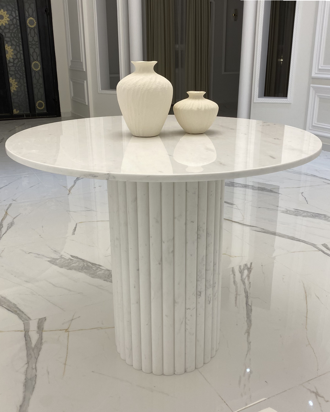 Full view of Nova Entrance Table with circular marble top and fluted base