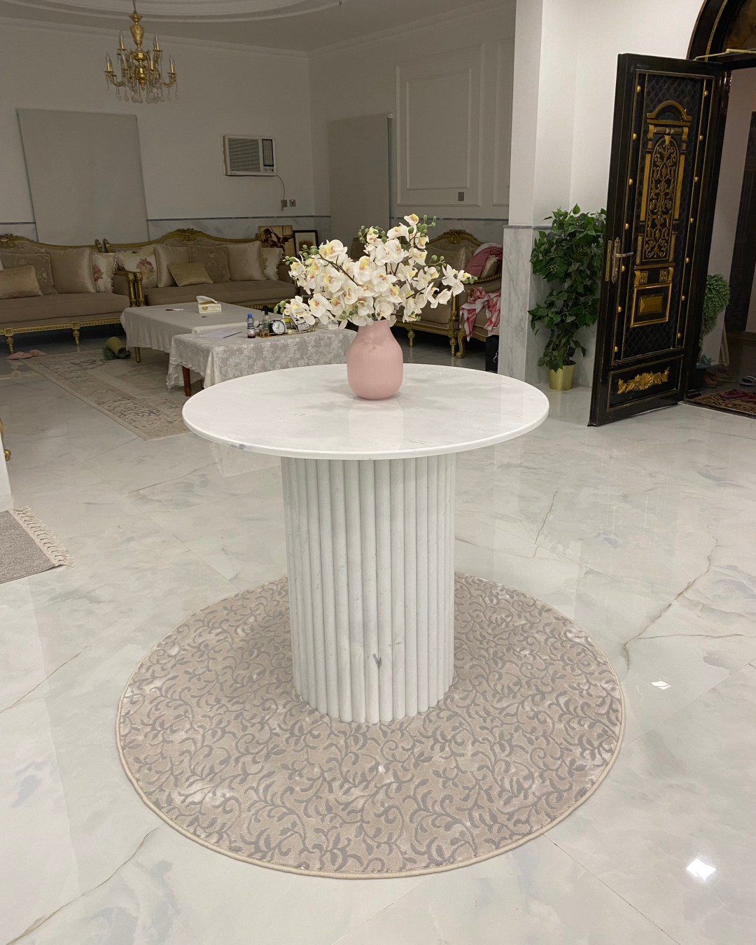 Nova Entrance Table styled in a foyer with lighting