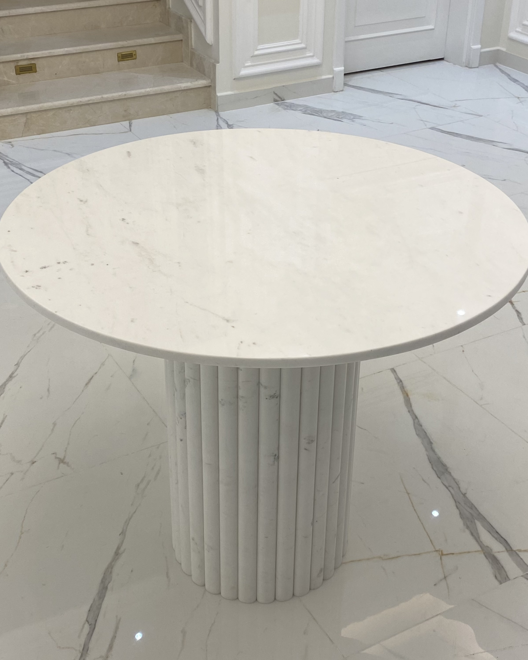 Top-down view of circular Polaris marble surface