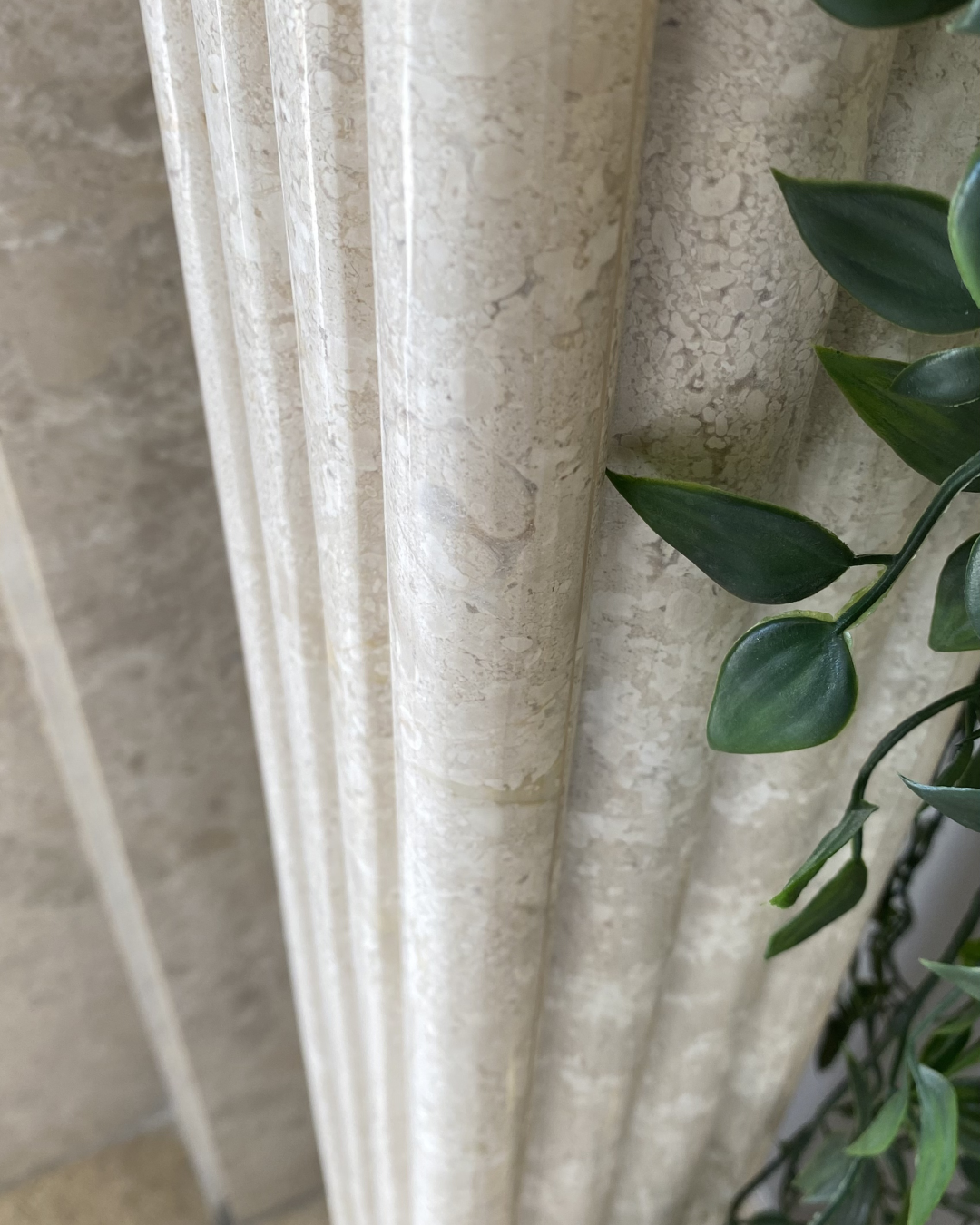 Close-up of Omani Beige stone texture with bevel detail