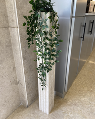 Orma Planter styled in a corner hallway with natural light