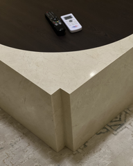Detailed view of how the wooden top sits into the stone base structure