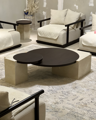 Side angle revealing notched stone base and round wood top interface