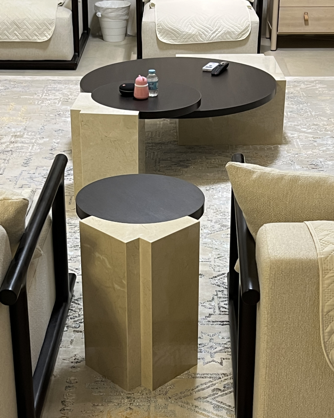 Styled view beside a neutral-toned armchair