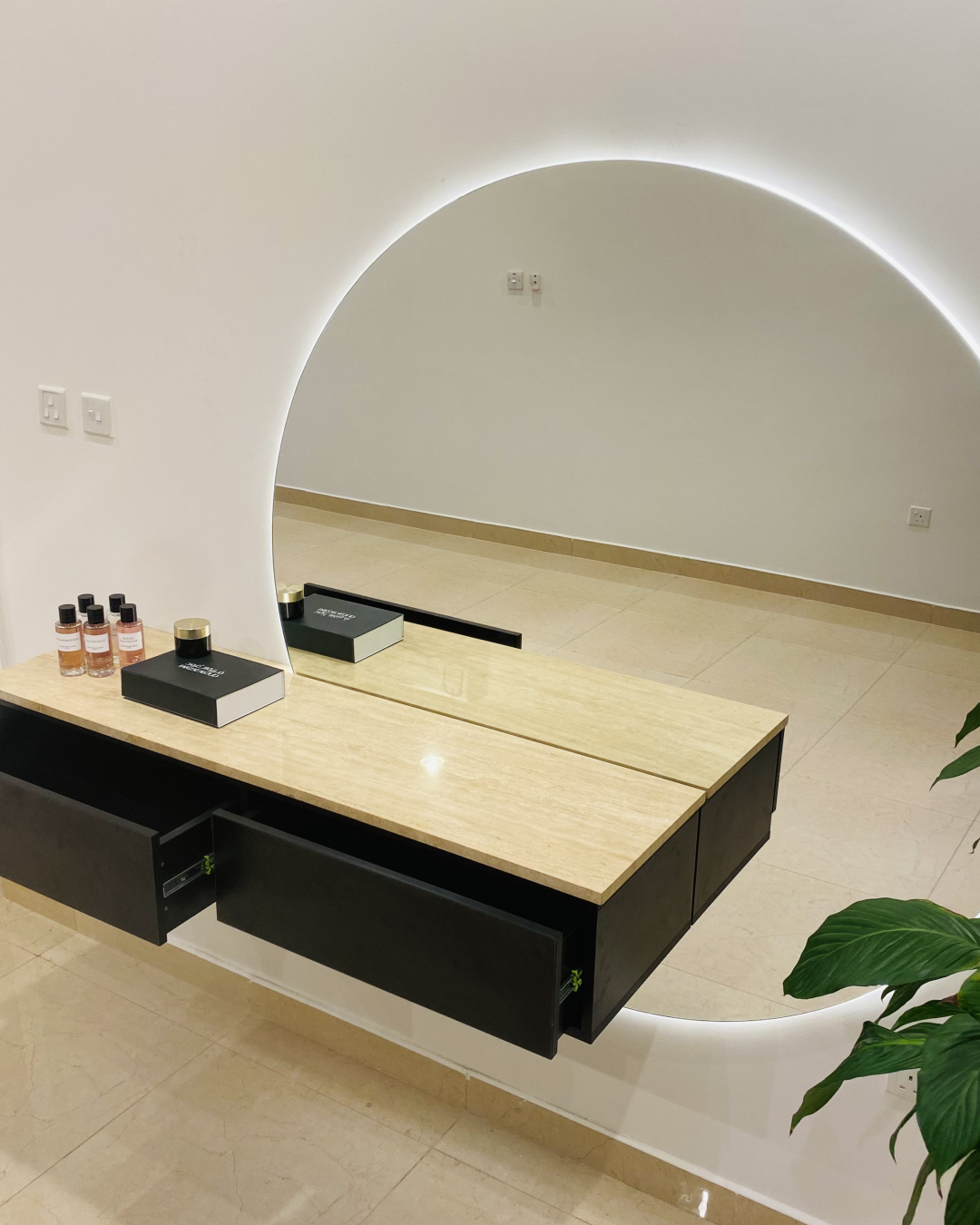 Angled view highlighting wall-mounted design and layered stone-wood contrast