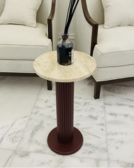 Full view of Raqia Serving Table with round marble top and fluted wood base