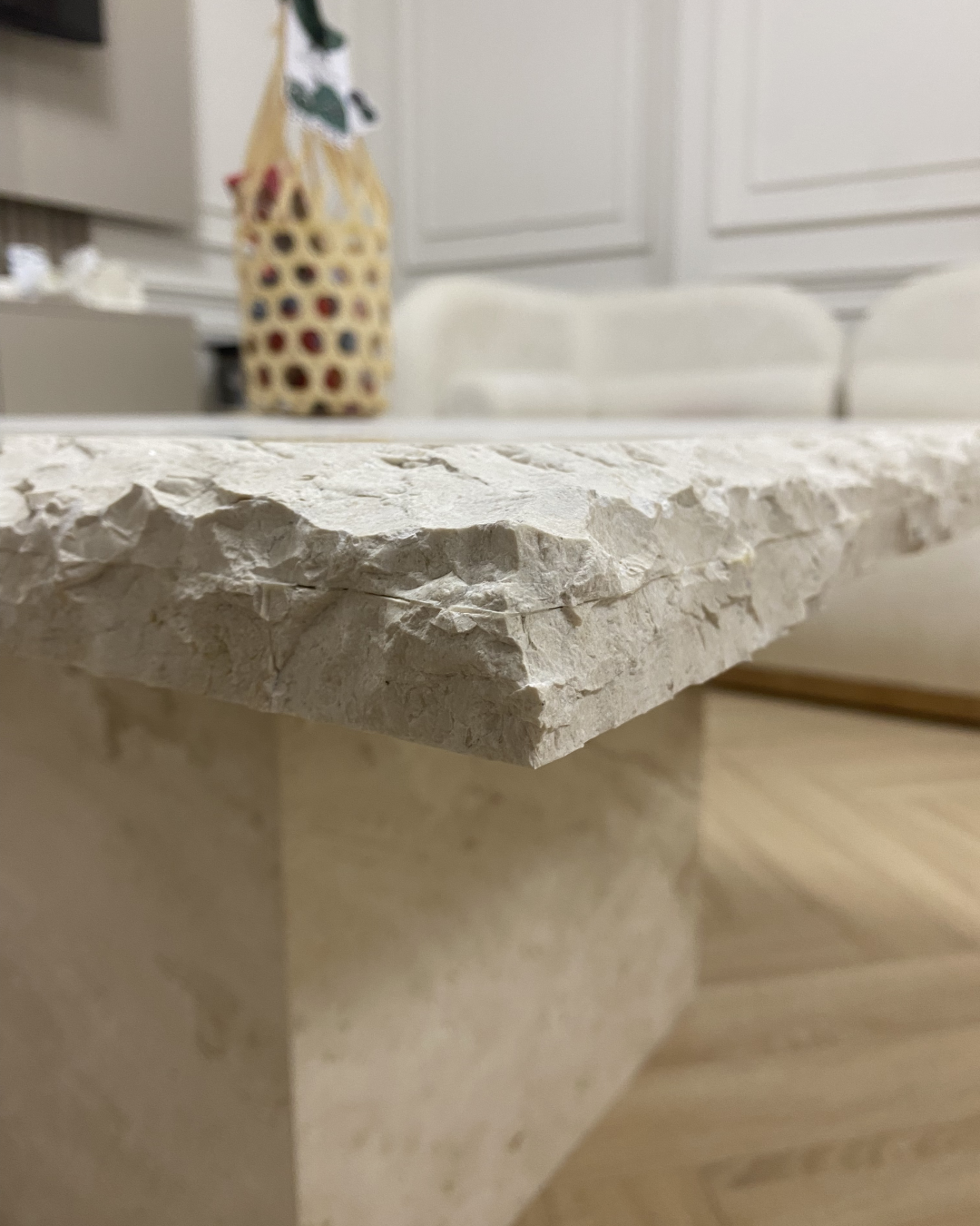 Close-up of the rugged chipped edge finish on Royal Dino marble top