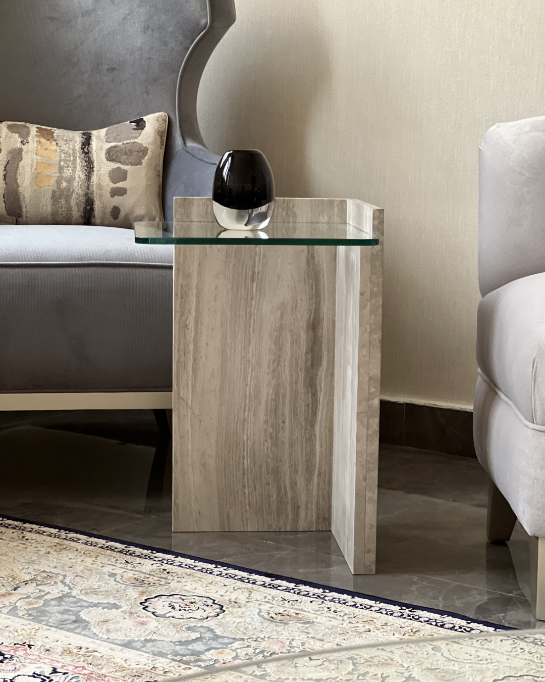 Intersecting marble slabs forming L-shape