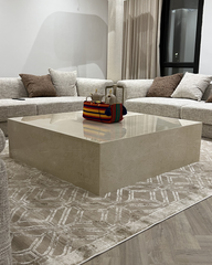 Solano Coffee Table full view in marble-finished lounge