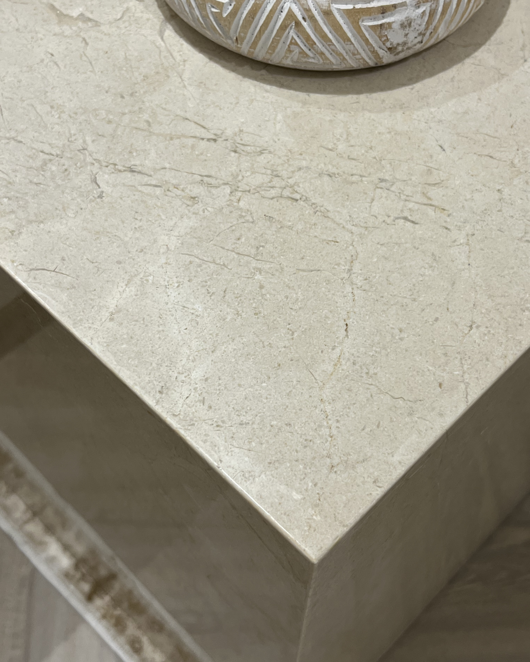 Close-up of polished marble surface with beveled edge