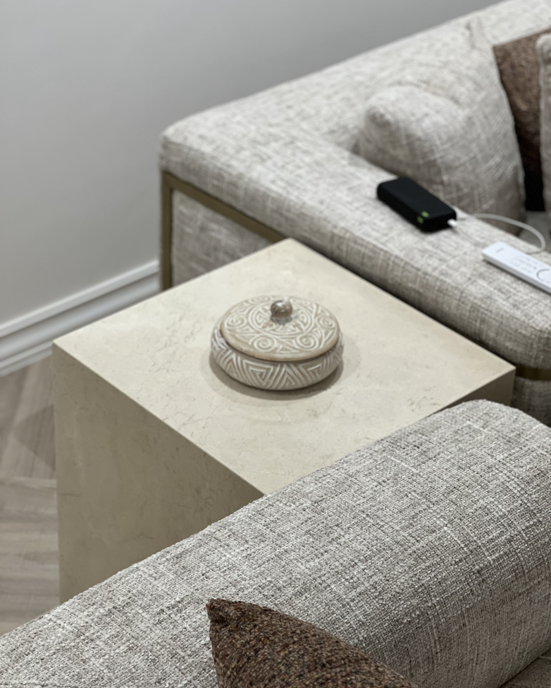 Solano Side Table beside a bed in a modern room
