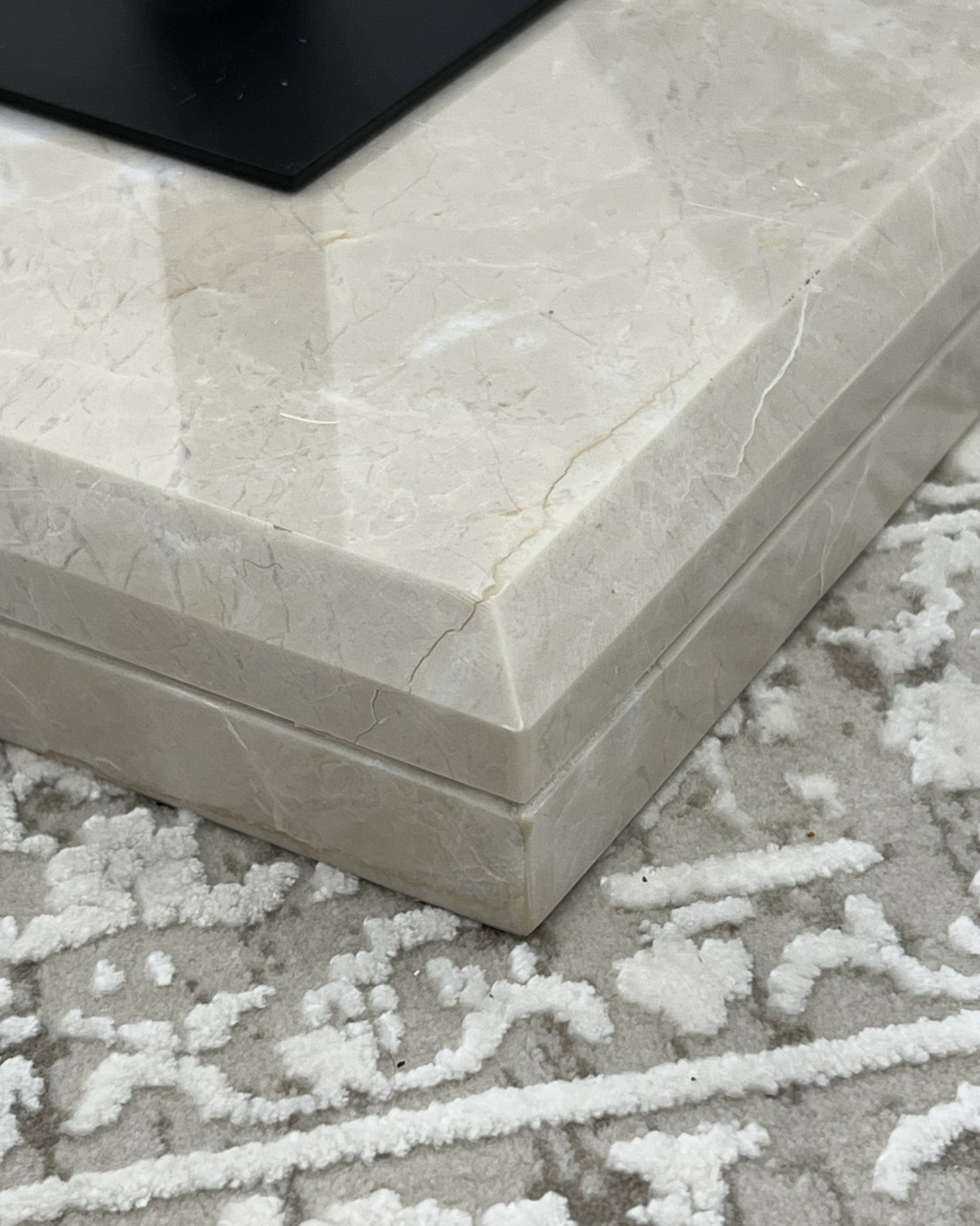 Close-up of Sweet Cream marble base