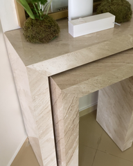 Close-up of marble texture and hand-finished mitered edge