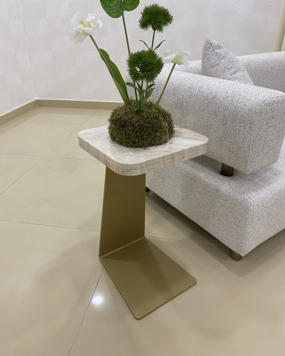 Front view of Zina Serving Table showing marble top and gold base