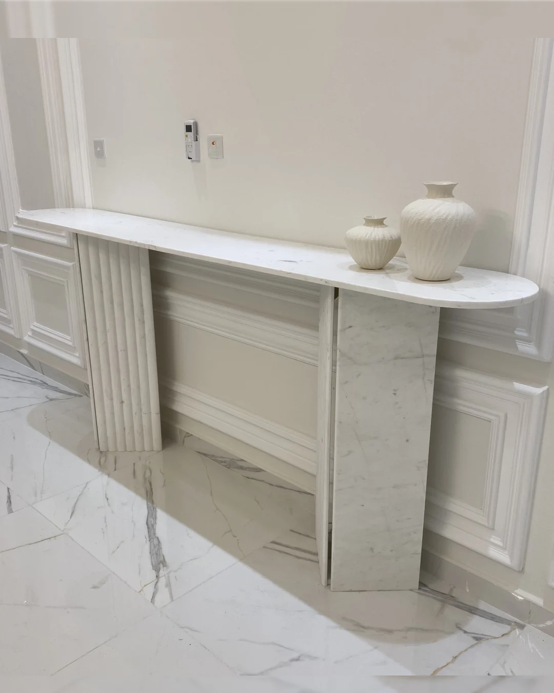 Full view of Nova Plano Console Table with fluted dual-panel base