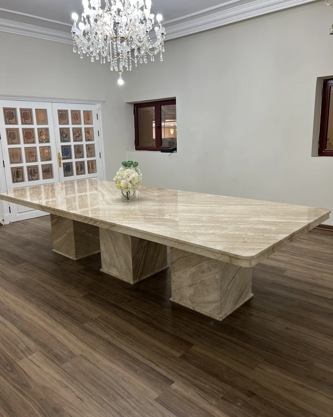 Full view of Valora Dining Table with book-matched marble top