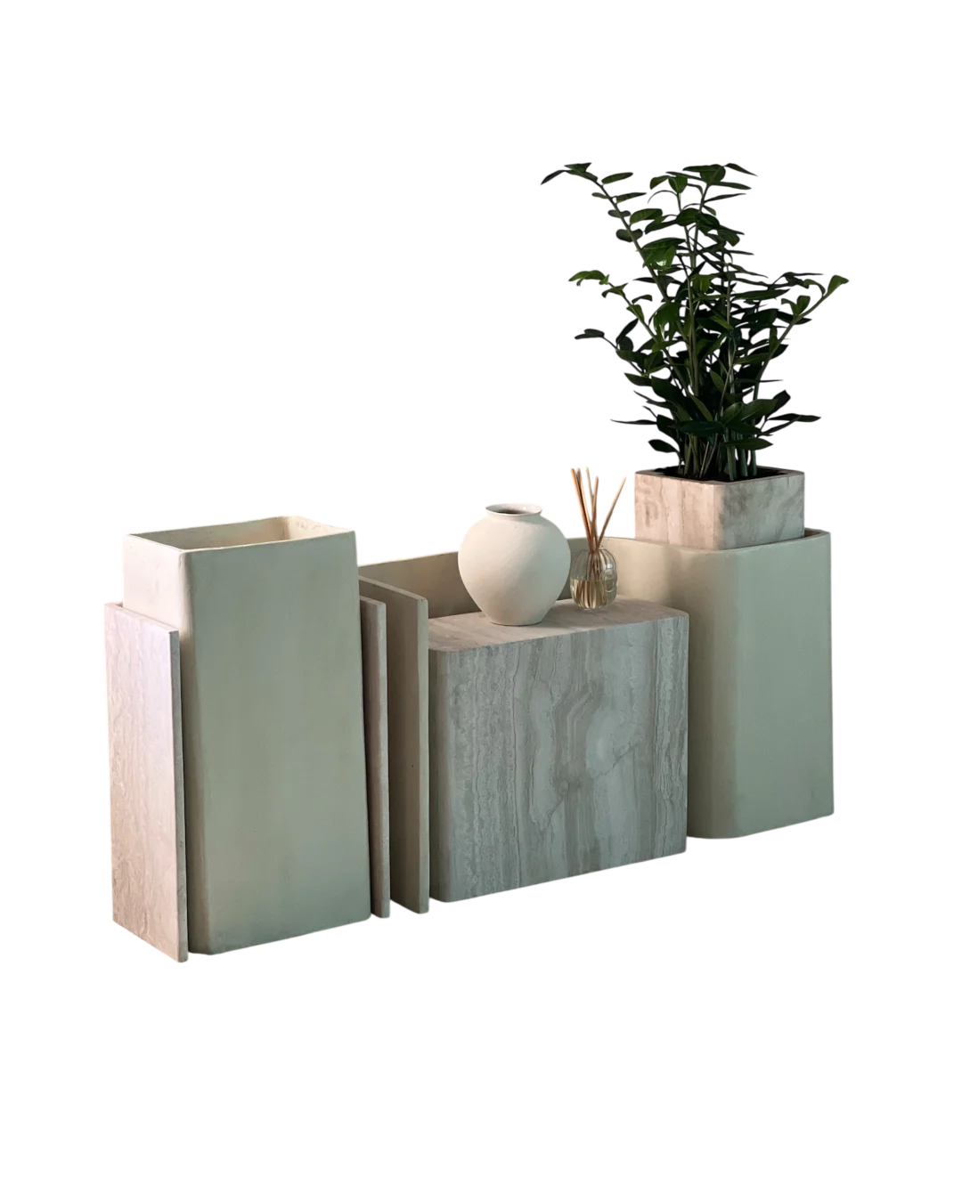 Front angled view showing full Forma Planter set with modular travertine and curved elements